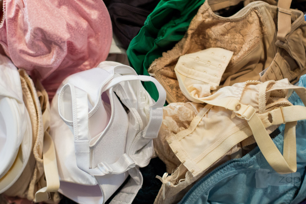 Rachael Heger sorts bras for Support the Girls