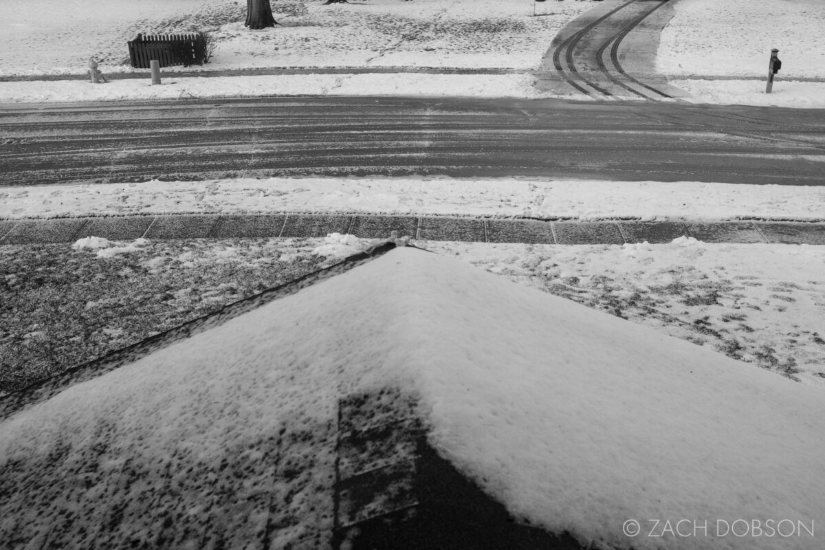 Geometric shapes and lines of a suburban street in the snow