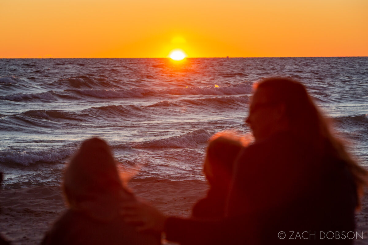 Family sunrise at the beach on Lake Huron at Hoeft State Park in Rogers City, Michigan