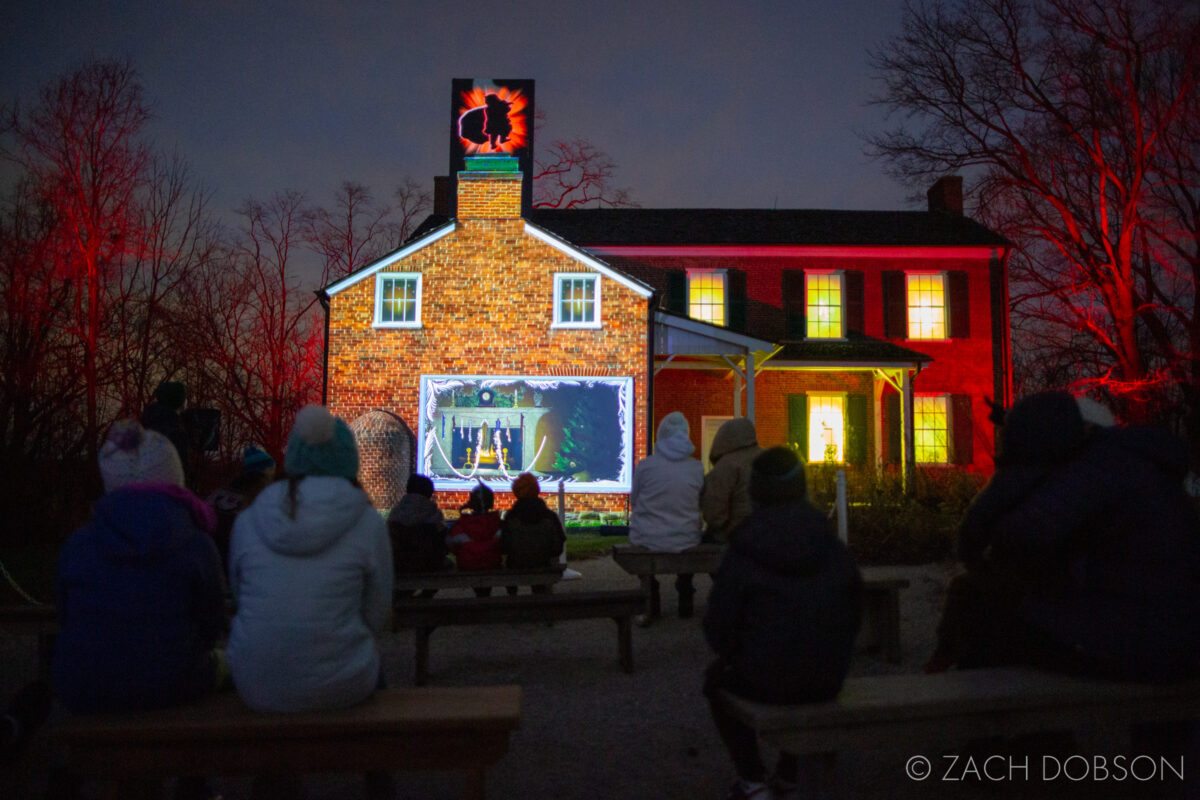 A Merry Prairie Holiday at Conner Prairie in Fishers, Indiana. Twas the night before christmas storytime projection