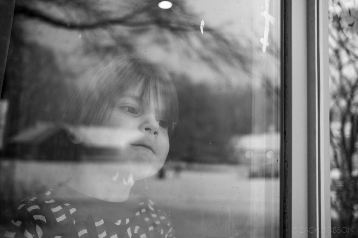 winter, looking through the window at the snow, carmel, indiana