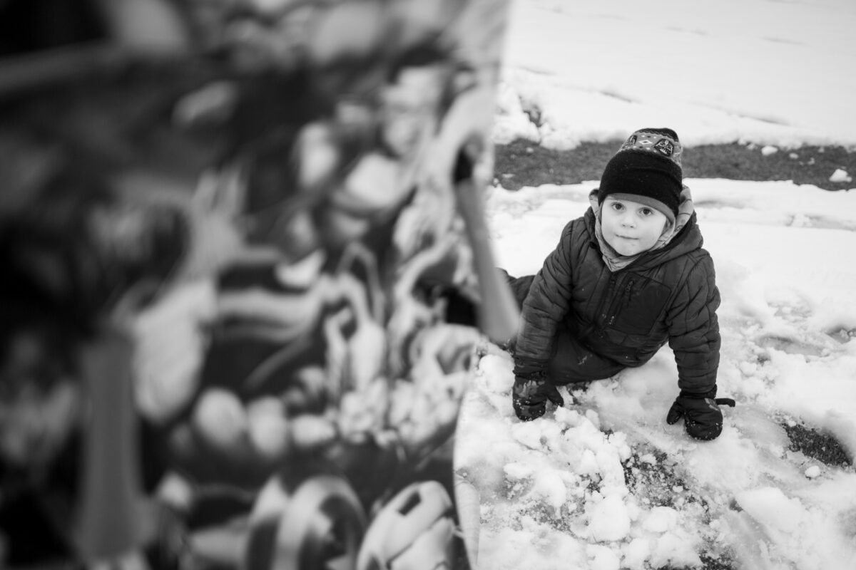 winter, sledding in the snow, carmel, indiana, black & white