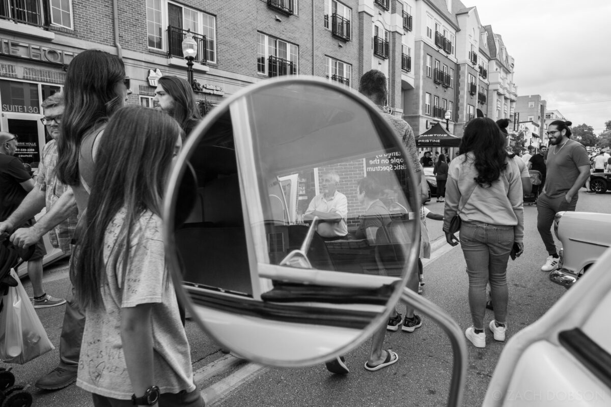 carmel artomobilia in the carmel arts & design district, indiana, sideview mirror reflection