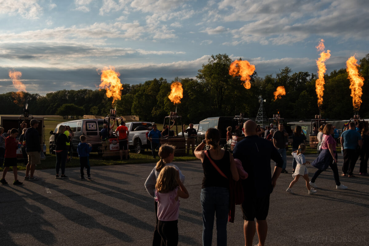 Hot air balloon crews light up the evening with a "sparkle" at the Jupiter Flights Balloon Festival at Conner Prairie Image: Zach Dobson Photography