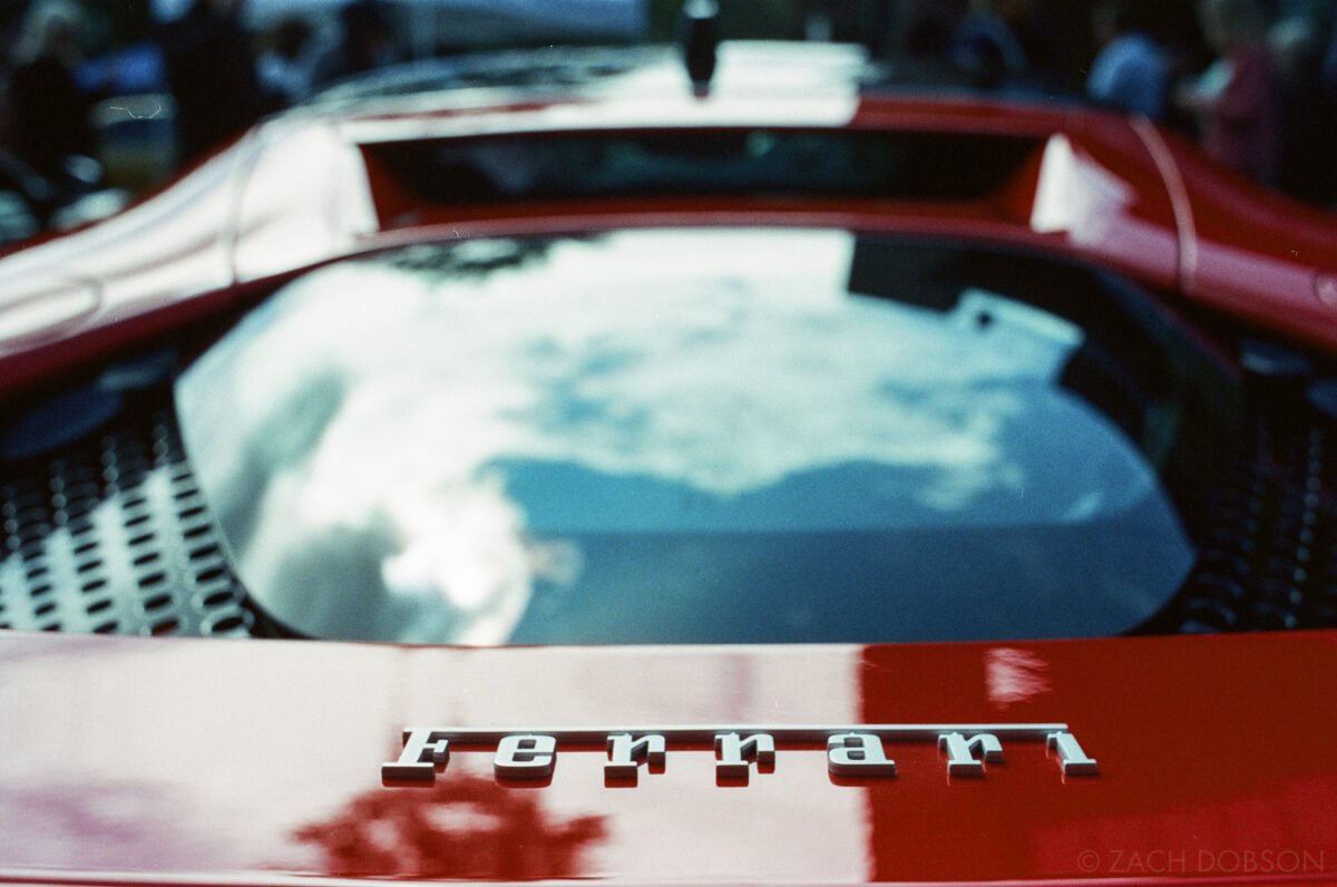 A Ferrari emblem at Carmel Artomobilia 2024