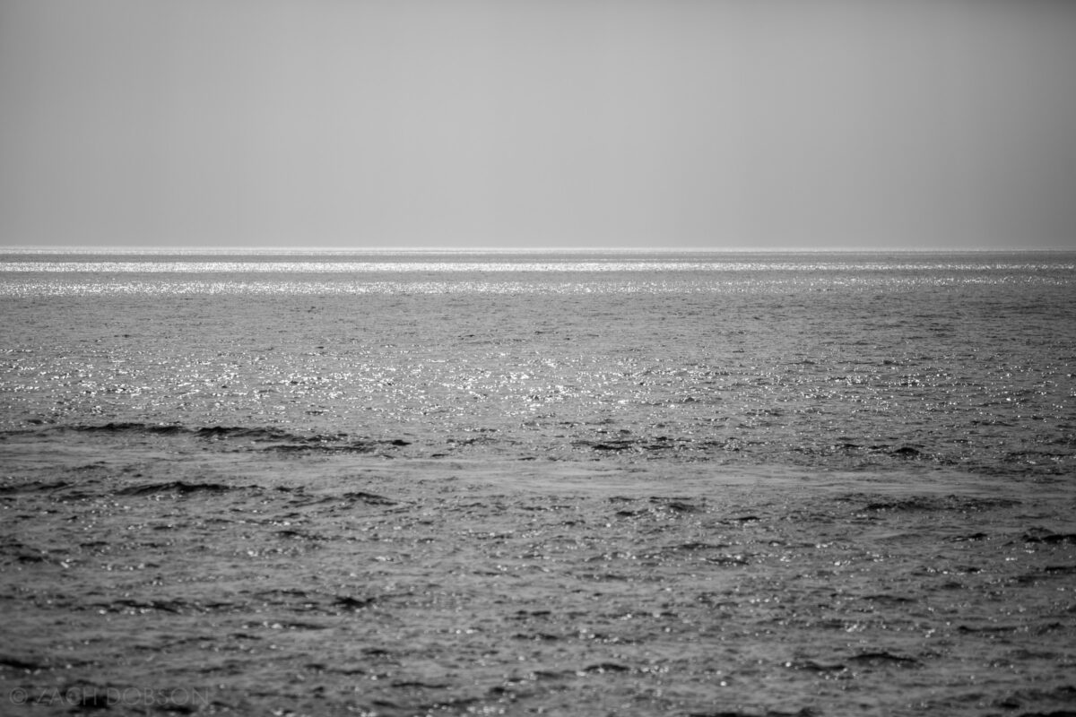 A black and white view of light on water in Lake Michigan