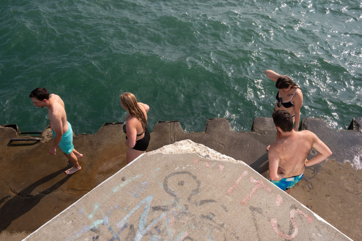 Swimming in Lake Michigan at Silver Beach in St. Joseph, Michigan at the end of the south pier.