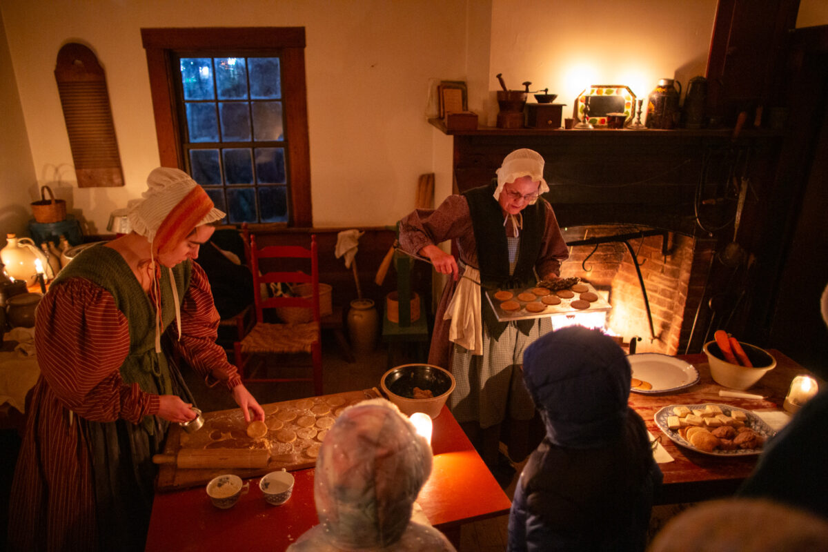 Photographing by candlelight at A Merry Prairie Holiday in Fishers, Indiana